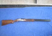 Breda Model B-4, 12 GA. over/under shotgun.