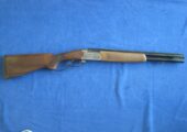 Angelo Zoli Apache 12 GA. Lever Action Over/Under shotgun.