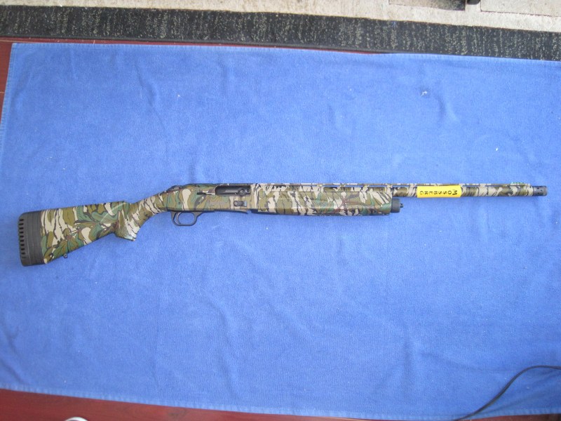 Mossberg 940 Pro 12 GA. Turkey Semi Auto shotgun Camo.
